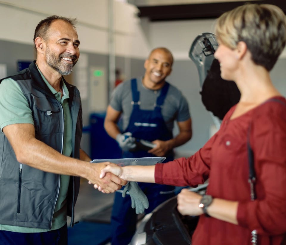 Man and woman shaking hands